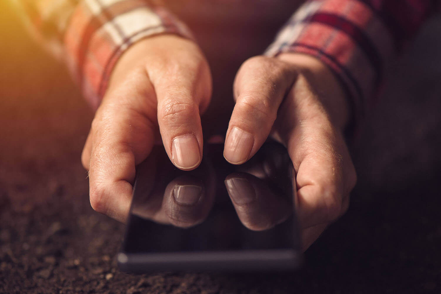 man holding cell phone